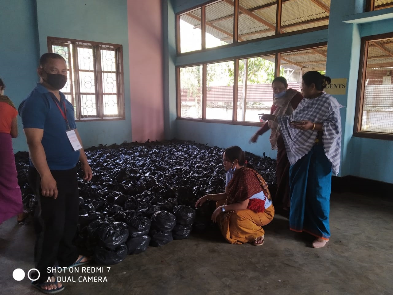  PLVs of Sugnu assisting in distribution of food materials provided by the Local MLA