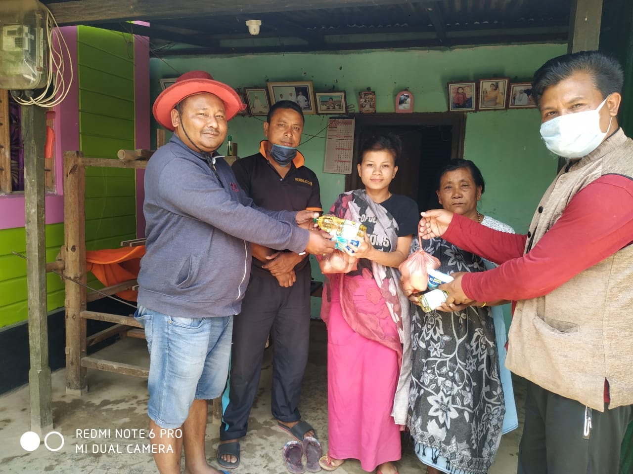 PLVs of Sugnu assisting in distribution of food materials provided by the Local MLA