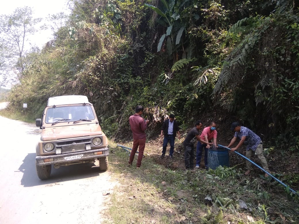  Nungba Legal Aid Clinic and Covid 19 volunteers arranging water for stranded trucks in Imphal Jiribam Highway