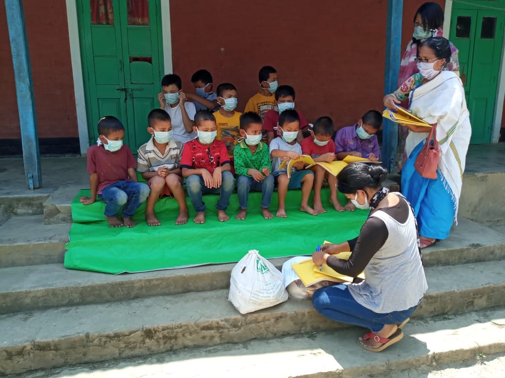  Legal Aid Clinic Thongju Imphal East distributed masks made by them to Children Homes and also took part in distribution of essential items in their area