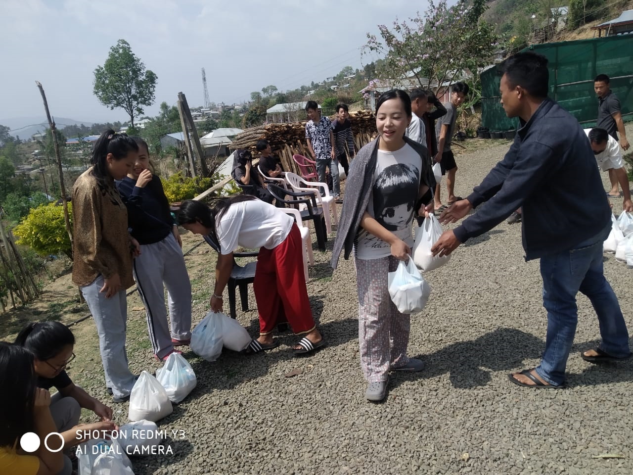  PLVs of Phalong Legal Aid Clinic assisting in distribution of food materials